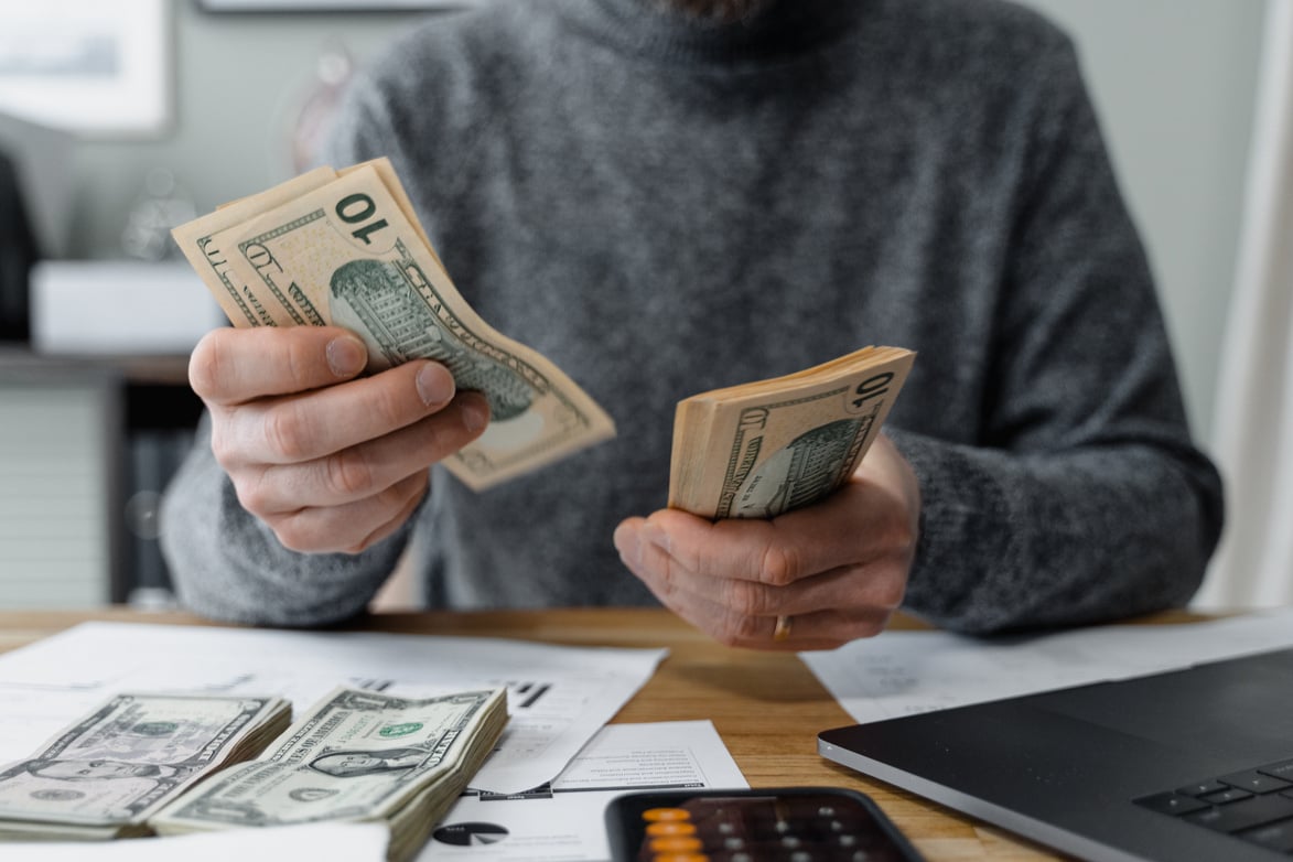 A Person Counting Money